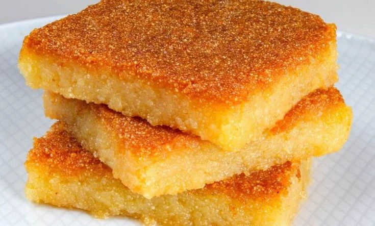 image about 🍯 طريقة عمل البسبوسة المرملة زي المحلات وأحسن: السر في الطراوة والطعم الأصلي