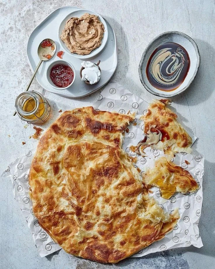 image about 🥧 سر الفطير المشلتت المصري: طريقة التحضير خطوة بخطوة وأسرار نجاحه في المنزل