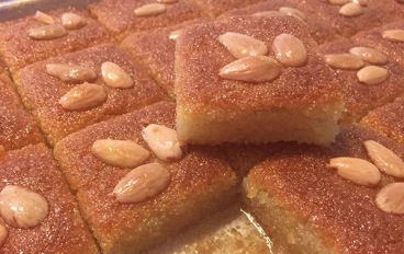 🍯 طريقة عمل البسبوسة المرملة زي المحلات وأحسن: السر في الطراوة والطعم الأصلي