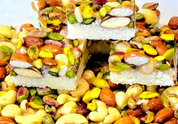 طريقة عمل حلى جوز الهند والمكسرات