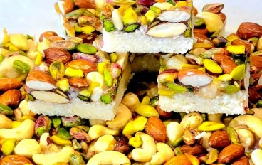 طريقة عمل حلى جوز الهند والمكسرات