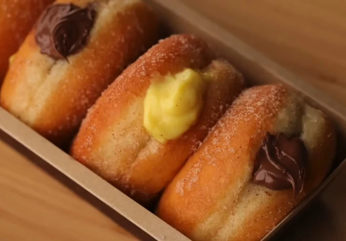 دليل شامل لعمل الدونتس المحشية مع أفضل أفكار الحشوات (كاسترد – شوكولاتة – لوتس)