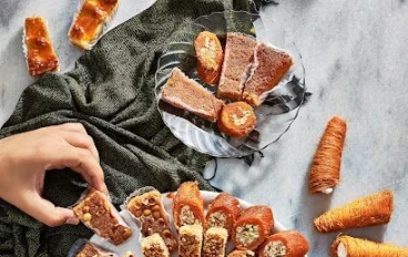 الحلويات العربية و تاثيرها على الثقافة و الهوية